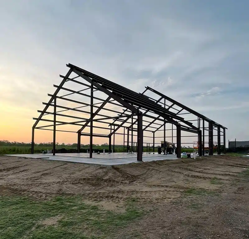 Barndominium frame at sunset in Tennessee